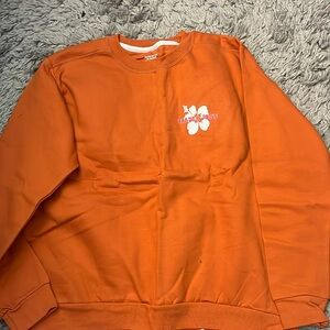 trader joe’s orange crewneck